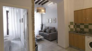A seating area at ALOJAMIENTO EN SEVILLA-TRIANA