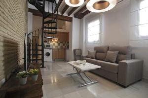 A seating area at ALOJAMIENTO EN SEVILLA-TRIANA