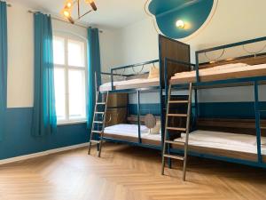 Cama ou camas em um quarto em Grand Hostel Berlin Classic