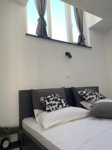 Postel nebo postele na pokoji v ubytování Modern Apartments Day