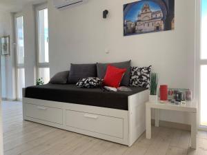 Postel nebo postele na pokoji v ubytování Modern Apartments Day