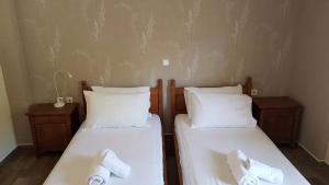 Rúm í herbergi á Evridiki Hotel