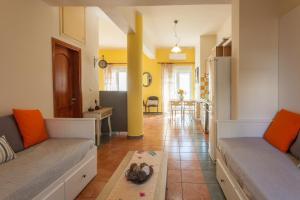 Posezení v ubytování Evelia Apartment