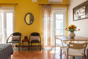 Posezení v ubytování Evelia Apartment