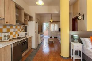 Kuchyň nebo kuchyňský kout v ubytování Evelia Apartment