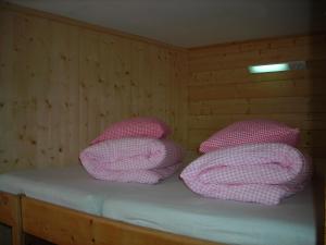Letto o letti in una camera di Skihütte Zams