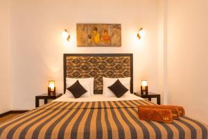 Una cama o camas en una habitación de L&D Stay Inn