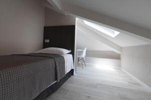 Ліжко або ліжка в номері Promenade Hotel
