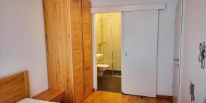Kúpeľňa v ubytovaní Appartements Nassfeld LUX + 37 fotografií