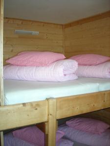 Letto o letti in una camera di Skihütte Zams