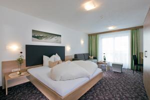 Ένα ή περισσότερα κρεβάτια σε δωμάτιο στο Hotel Puint