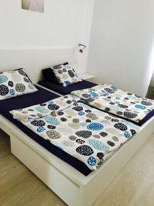 Un pat sau paturi într-o cameră la apartmant Adrian Vista Taurito