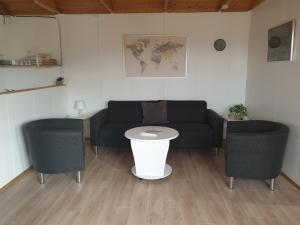 Posezení v ubytování Við-Bót Riverside Cottage