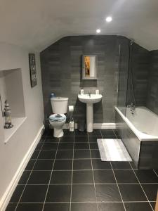 Ванная комната в Pleasure Beach House +6 фотографий
