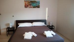 Posteľ alebo postele v izbe v ubytovaní B&B Stella Di Mare