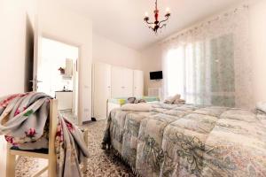 Postel nebo postele na pokoji v ubytování MADI' casa vacanze