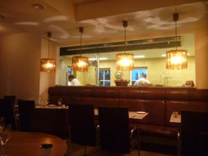 Restaurant ou autre lieu de restauration dans l'établissement Hotelsuites Ambrosijn