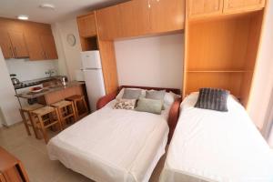 Kuchyň nebo kuchyňský kout v ubytování APARTBEACH ADRIATICO 518 VISTAS PLAYA y CLIMATIZADO