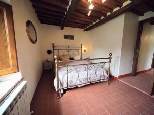 Giường trong phòng chung tại Casa Patrizia