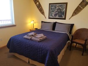 Postel nebo postele na pokoji v ubytování Talkeetna Hideaway