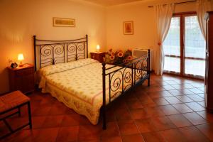 Cama o camas de una habitación en Villa Etruria Guest House