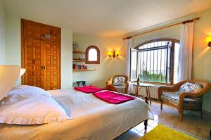A bed or beds in a room at Casa Resa