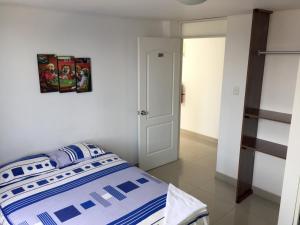 Ένα ή περισσότερα κρεβάτια σε δωμάτιο στο Hostal Sueños