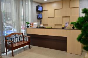 TV a/nebo společenská místnost v ubytování New City Hotel