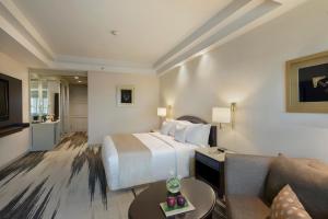 Letto o letti in una camera di Gran Melia Jakarta