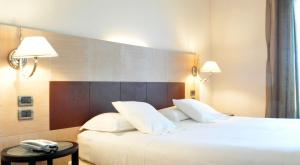 Tempat tidur dalam kamar di San Giorgio, Sure Hotel Collection by Best Western