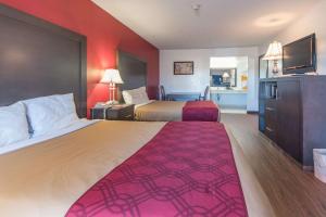 Postel nebo postele na pokoji v ubytování Econo Lodge