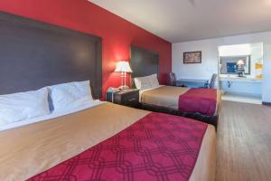 Postel nebo postele na pokoji v ubytování Econo Lodge