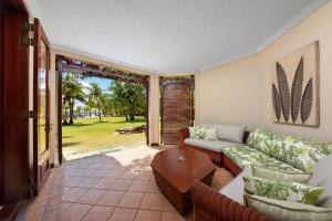Гостиная зона в Dinarobin Beachcomber Golf Resort & Spa