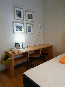 Postel nebo postele na pokoji v ubytování Tong Stay