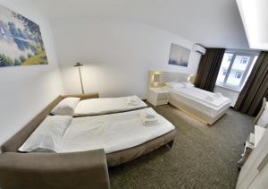 Llit o llits en una habitació de Apartment OneClickRent_06-Smart House