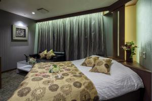 Katil atau katil-katil dalam bilik di Restay Hiroshima (Adult Only)