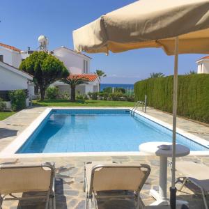 Bazén v ubytování Platzia Beach Villas nebo v jeho okolí