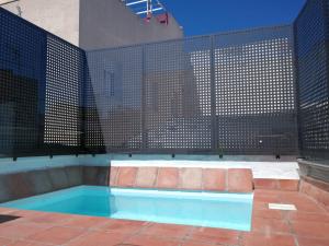 Basen w obiekcie Casas de Sevilla - Casa Sevillana Harinas26 lub w pobliżu