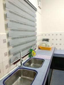 Köök või kööginurk majutusasutuses D'Rusa Homestay