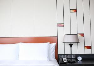 Una cama o camas en una habitación de Grand Hyatt Changsha