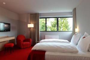 Postel nebo postele na pokoji v ubytování The Seven Hotel + 48 fotografií