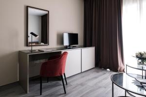 TV a/nebo společenská místnost v ubytování Urban Valley Resort & Spa