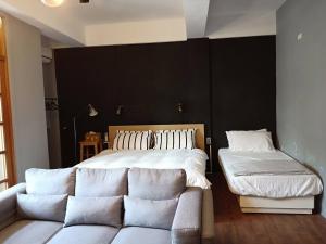 Voodi või voodid majutusasutuse Formosa Backpackers Hostel & Apartment（青年民宿） toas