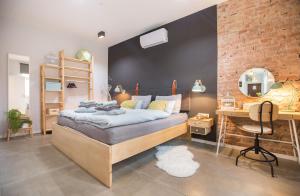 Ένα ή περισσότερα κρεβάτια σε δωμάτιο στο Carpe diem Apartments Cvjetni