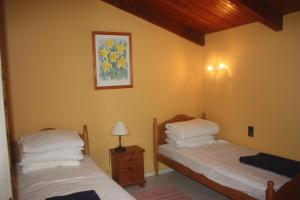 מיטה או מיטות בחדר ב-Maison - Limoux