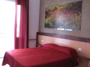 Een bed of bedden in een kamer bij Residence Casale Verderame