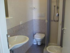 Een badkamer bij Residence Casale Verderame