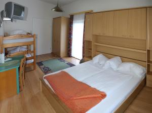 Een bed of bedden in een kamer bij Strandhotel Pichler