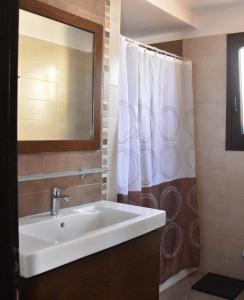 Koupelna v ubytování Patras Roof apartment