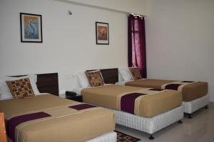 Cama o camas de una habitación en Hotel Bodh Vilas